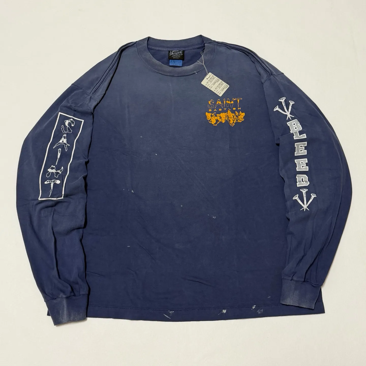 SAINT Mxxxxxx × BABYLON BBLN_LS TEE/SAINT BABYLON/NVY/BABYLON co-branded style Wolf head SAINT/nail distressed long sleeves Washed blue S-XL Completely matched Tube weaving fabric without side seams Garment dyeing Maliu water faded distressing Simulated sun fading treatment Natural fading Handmade holes and frayed Ink splashing treatment Correct main mark/wash mark/little angel anti-counterfeiting mark